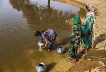 Girls collect water in Rajasthan, India
