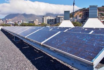 Solar panels on rooftop of building in Cape Town, South Africa